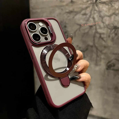 Phone case with ring holder held by a hand against a neutral background
