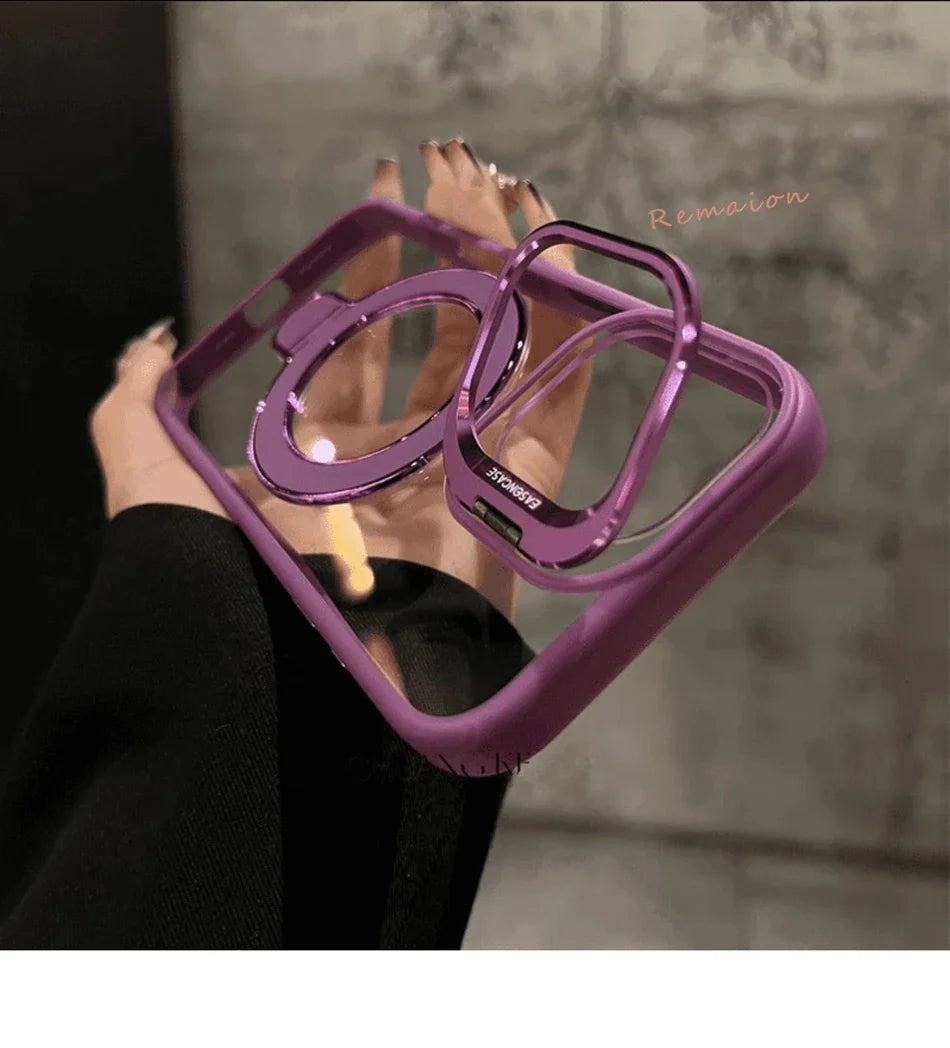 Purple phone case with heart-shaped design held by a person against a blurred background