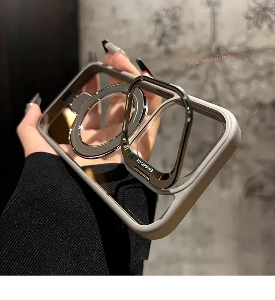 Phone case with ring holder held by a hand against a neutral background