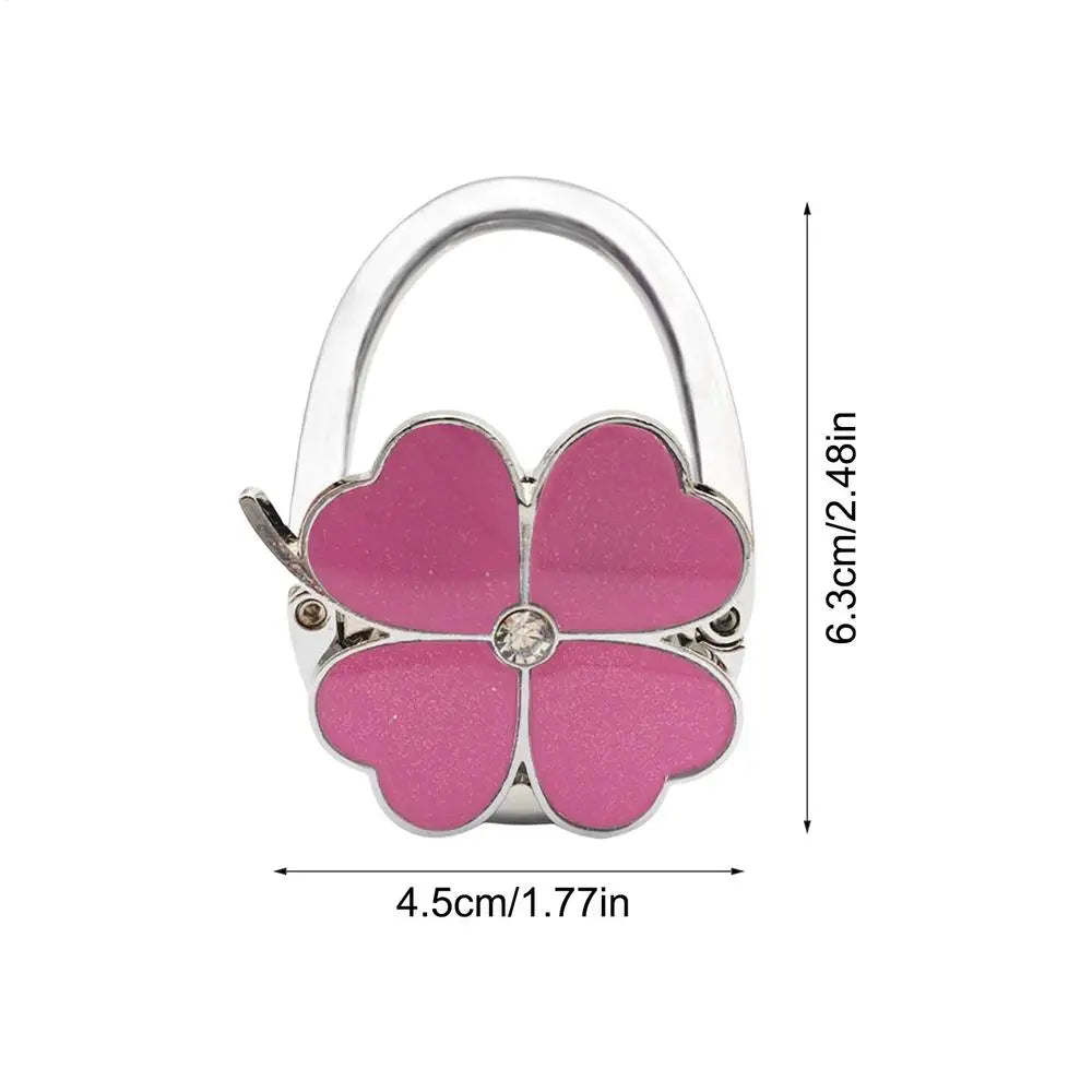 Klappbarer Taschenhalter für den Tisch