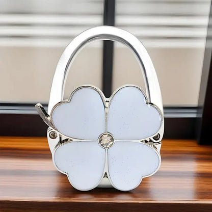 Klappbarer Taschenhalter für den Tisch