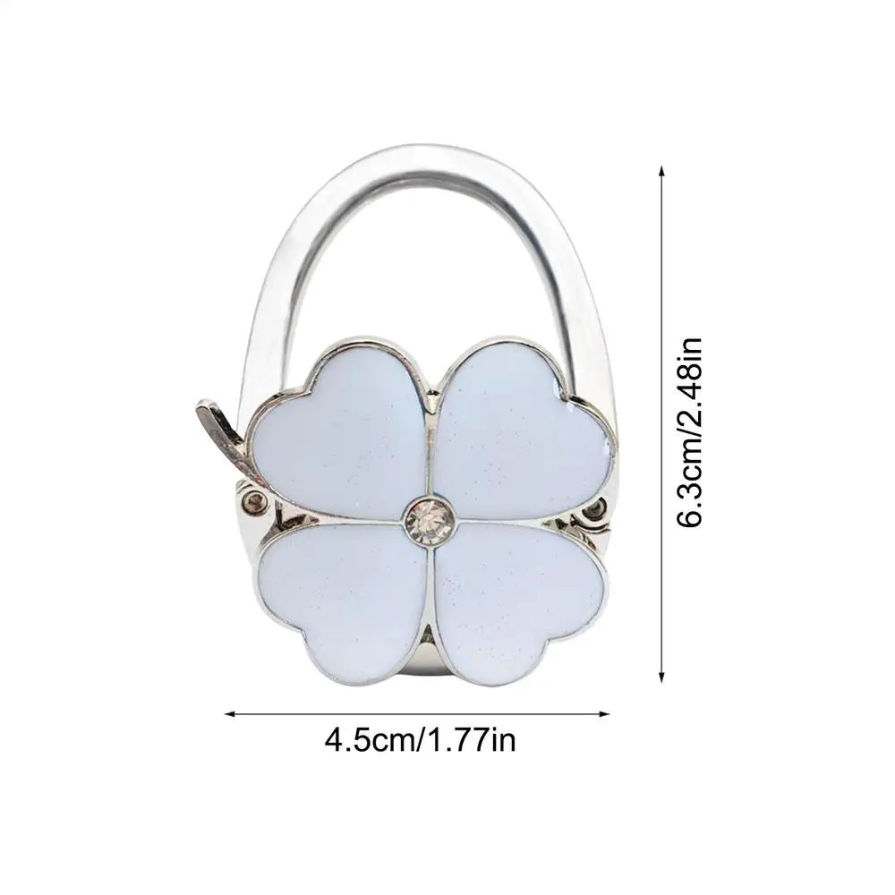 Klappbarer Taschenhalter für den Tisch