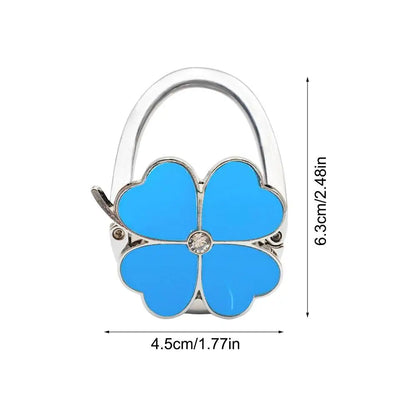 Klappbarer Taschenhalter für den Tisch