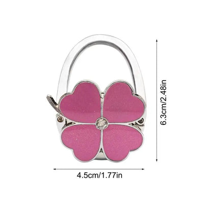 Klappbarer Taschenhalter für den Tisch